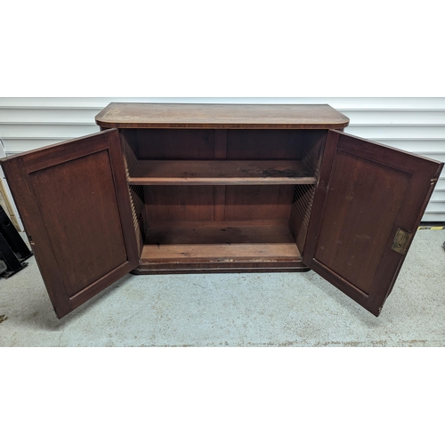 401 - A Mahogany Two Door Cabinet.