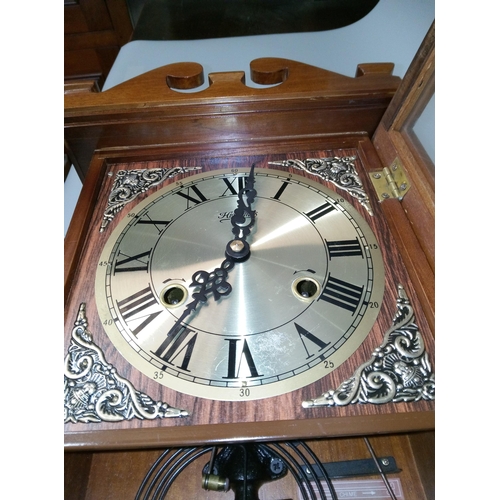 404 - A Vintage Brass Faced Wall Clock.