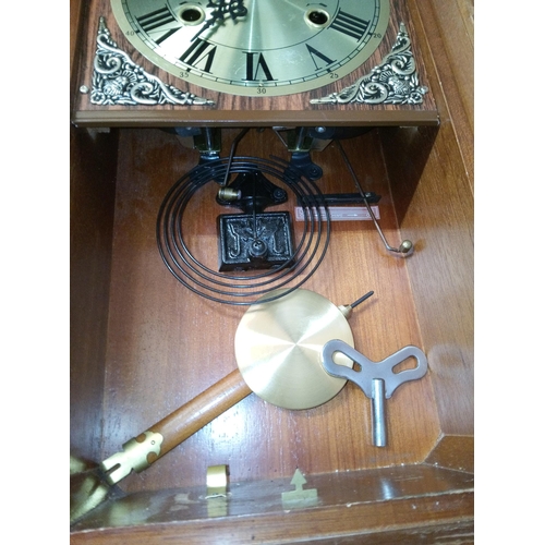 404 - A Vintage Brass Faced Wall Clock.