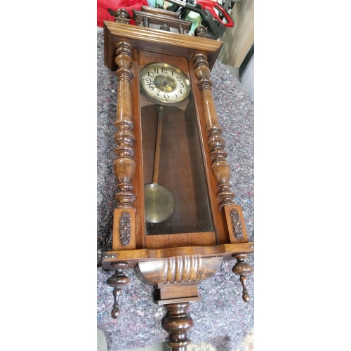 407 - Ornate Dark Wood Wall Clock with Glass Front to Pendulum Case.