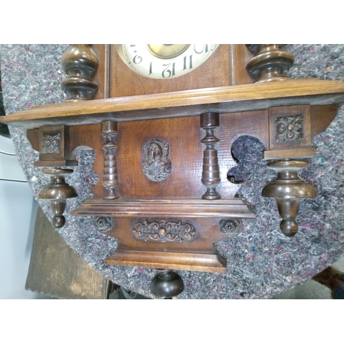 407 - Ornate Dark Wood Wall Clock with Glass Front to Pendulum Case.