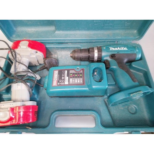 126D - Makita Drill with 2 Batteries, Charger and Case.