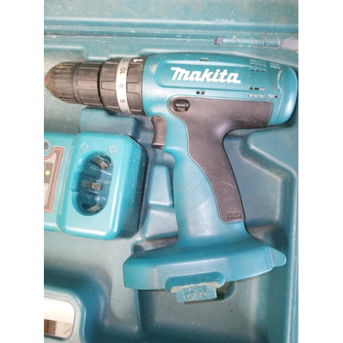 126D - Makita Drill with 2 Batteries, Charger and Case.