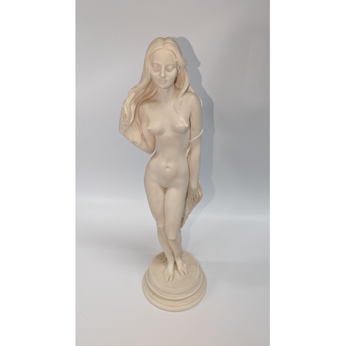 442 - A Figurine of a Lady with an enigmatic smile. 

43cm Tall.