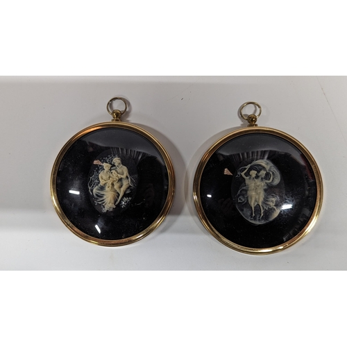 657 - A Pair of Peter Bates Cameo Miniatures.