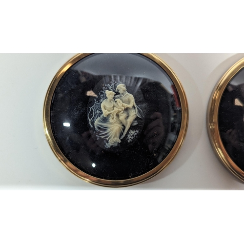 657 - A Pair of Peter Bates Cameo Miniatures.