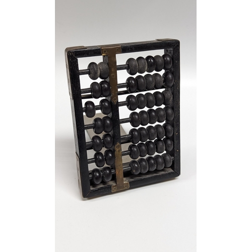 652 - An Antique Chinese Abacus.