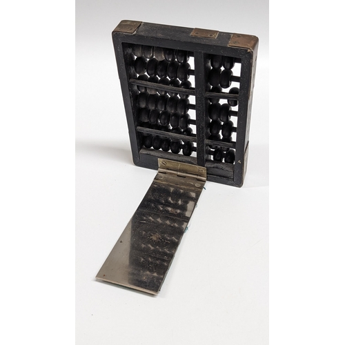 652 - An Antique Chinese Abacus.