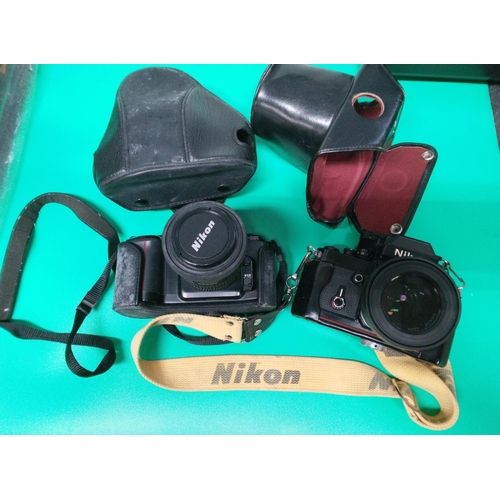 217D - A Pair of Nikon Cameras, A Nikon AF-F601 and Nikon AS.