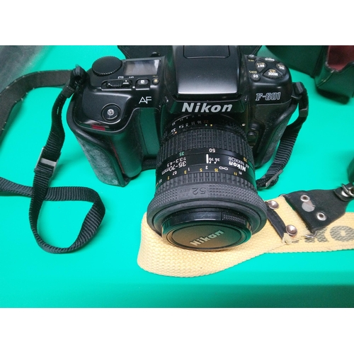 217D - A Pair of Nikon Cameras, A Nikon AF-F601 and Nikon AS.