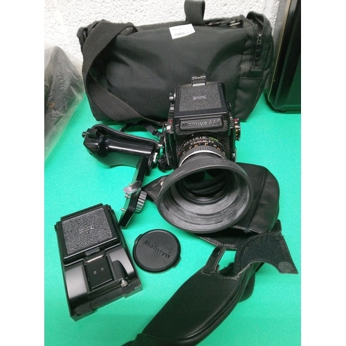 218A - Mamiya 645 Camera and Attachments in Storage Bag.