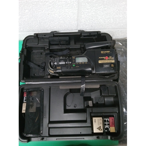 218D - Sharp Flying Erase VL-C750 Video Camera and Attachment in Original Case.