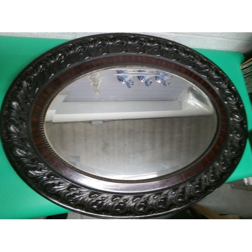 236A - Bevelled Oval Mirror in Carved Frame 94cm H x 69cm W.