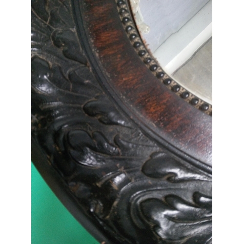 236A - Bevelled Oval Mirror in Carved Frame 94cm H x 69cm W.