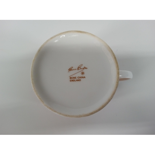 659 - A Set Of 6 x Suzie Cooper Demitasse Cups and Saucers (1 cracked).