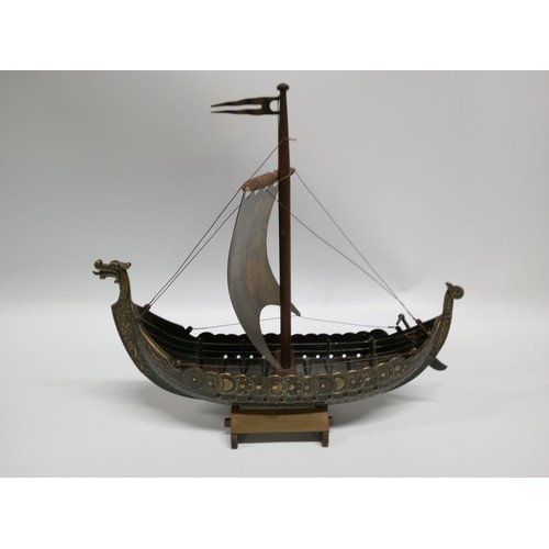 447 - A Bronze Viking Longship Ornament. 38cm L x 40cm H.