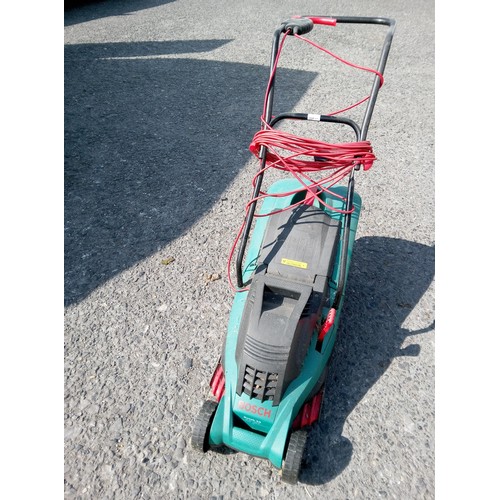 61C - A Bosch Electric Lawn Mower.