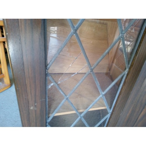 356 - A Heavy Oak Corner Bar with Carved Details and Leaded Glass Cupboard Doors (2 Panes Cracked).