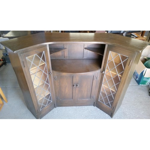 356 - A Heavy Oak Corner Bar with Carved Details and Leaded Glass Cupboard Doors (2 Panes Cracked).