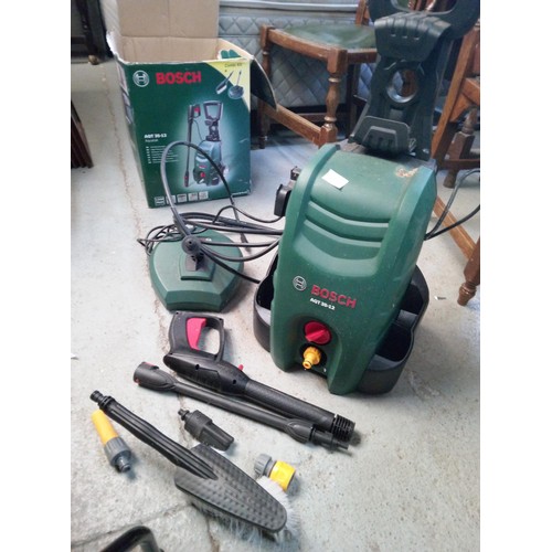 75B - Bosch AQT 35-12A Aquatak Power Washer. With attachments in original box.