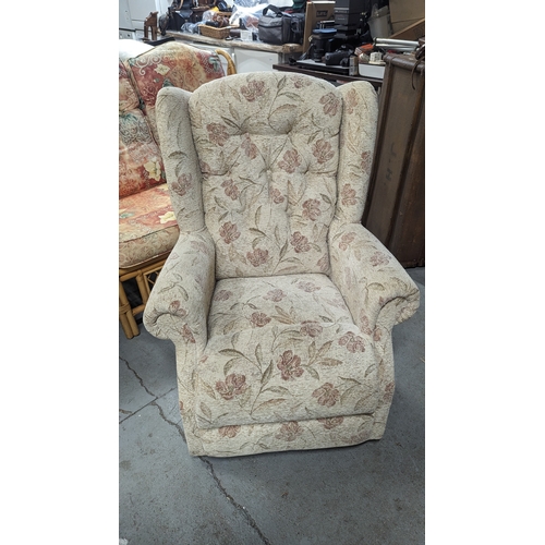 799B - An Upholstered Wing Back Armchair