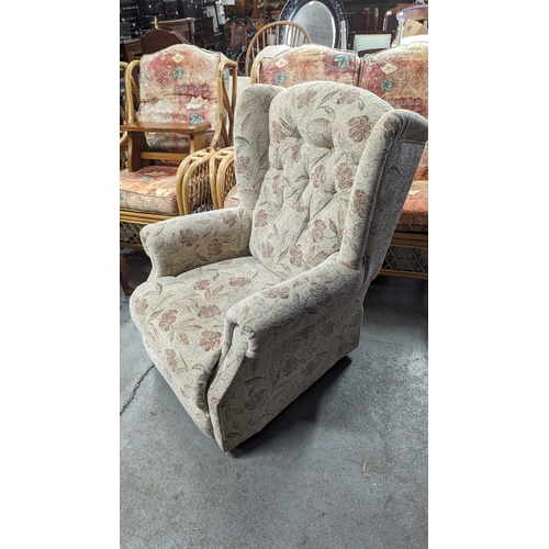 799B - An Upholstered Wing Back Armchair