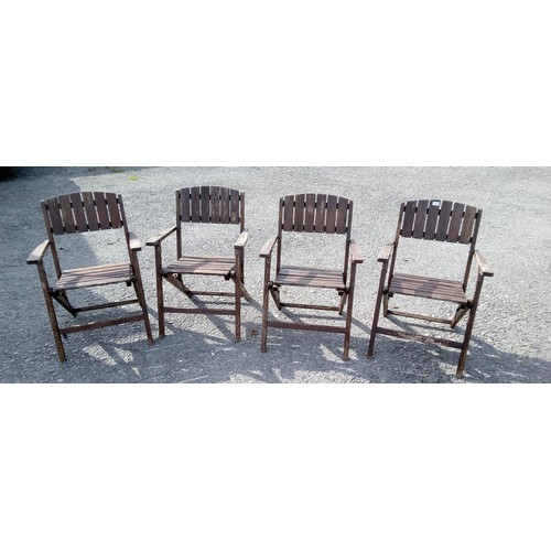 1266 - 4 x Hard Wood Folding Chairs.