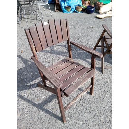 1266 - 4 x Hard Wood Folding Chairs.