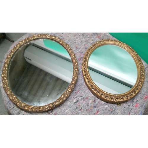 703 - A Pair of Oval Gilt Framed Mirror - 55m x 44cm and 44cm x 36cm