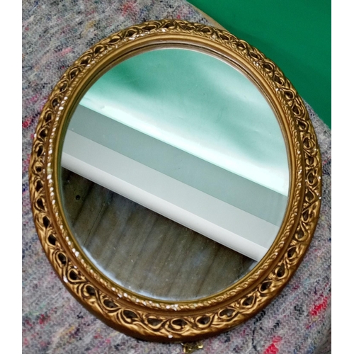 703 - A Pair of Oval Gilt Framed Mirror - 55m x 44cm and 44cm x 36cm