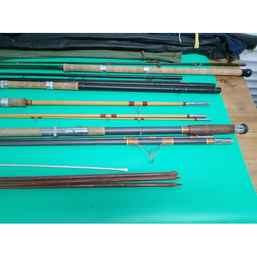 155B - A Selection of Vintage Fishing Rods.