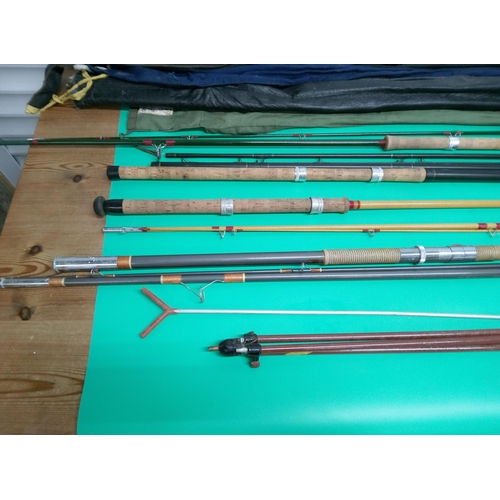 155B - A Selection of Vintage Fishing Rods.