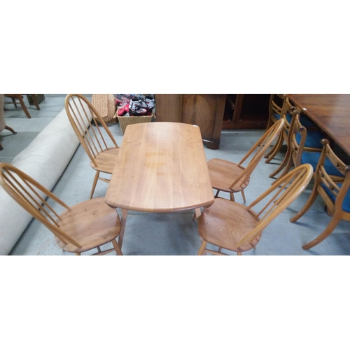 974 - Ercol Blonde Drop Leaf Dining Table with 4 Ercol Blonde Quaker Windsor Dining Chairs.