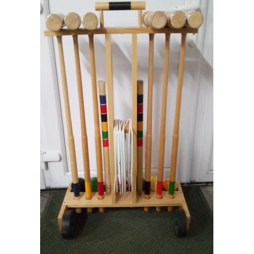154 - A Large Wooden Croquet Set in Stand.
