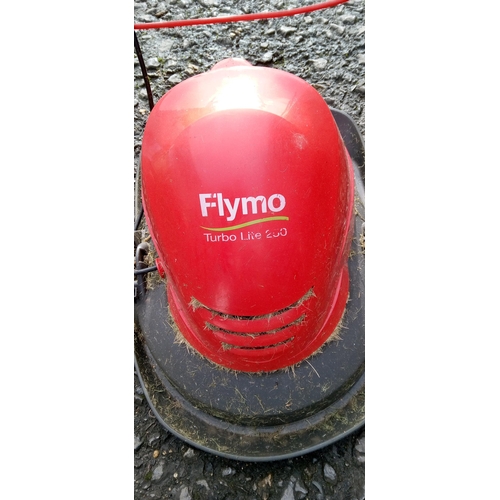 85 - A Flymo Electric Hoover Mower.