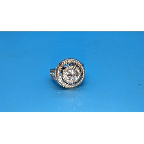 593 - Large silver cocktail ring, cluster set with cubic zirconia