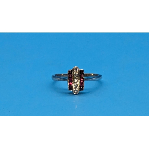 576 - An 18ct Hallmarked White Gold Plated Art Deco Diamond and Ruby Ring. Size P/Q.