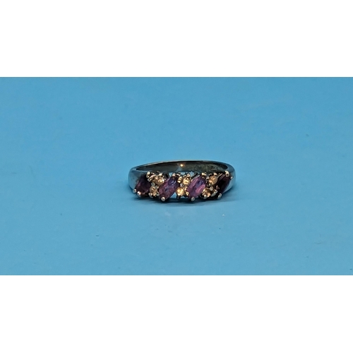 592 - A 9ct White Gold and Amethyst Ring. Size M/N.