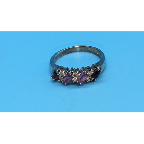 592 - A 9ct White Gold and Amethyst Ring. Size M/N.