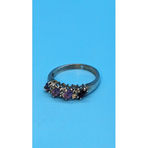 592 - A 9ct White Gold and Amethyst Ring. Size M/N.