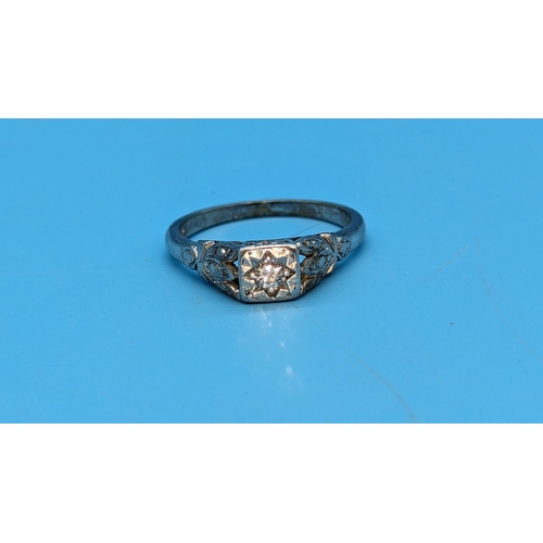 583 - A Diamond and 18ct White Gold Ring. Size N/O. 4gms Total Weight.