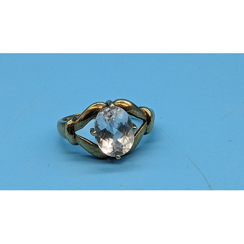 594 - A 9ct Yellow Gold Ring with Large White Stone Size N/O