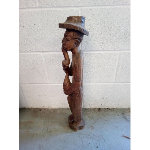 390 - Wooden Carved Ethnic Man Smoking a Pipe. Standing 64cm.