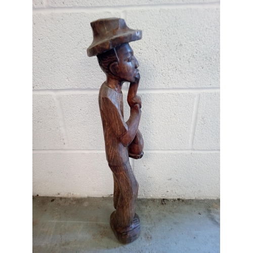 390 - Wooden Carved Ethnic Man Smoking a Pipe. Standing 64cm.