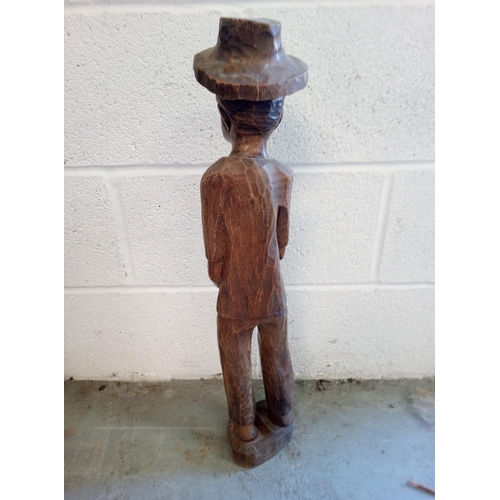 390 - Wooden Carved Ethnic Man Smoking a Pipe. Standing 64cm.