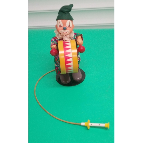 678 - Vacuum Pump Toy Clown and  4 x Vintage Jet - Propelled Boats.