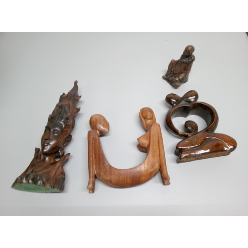 918 - Selection of Wooden and Resin Figures including a resin clown, 2 wooden carved couples and a Bali go... 