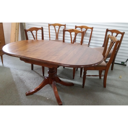 540 - A Ducal Drop Leaf Table and 6 Chairs.
73cm H x 92cm W x 64cm Extended, 15 cm Closed.