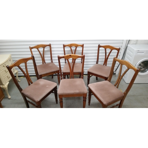 540 - A Ducal Drop Leaf Table and 6 Chairs.
73cm H x 92cm W x 64cm Extended, 15 cm Closed.