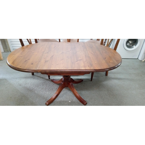 540 - A Ducal Drop Leaf Table and 6 Chairs.
73cm H x 92cm W x 64cm Extended, 15 cm Closed.